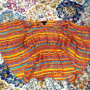 Beautiful, colored blouse ready for a new home